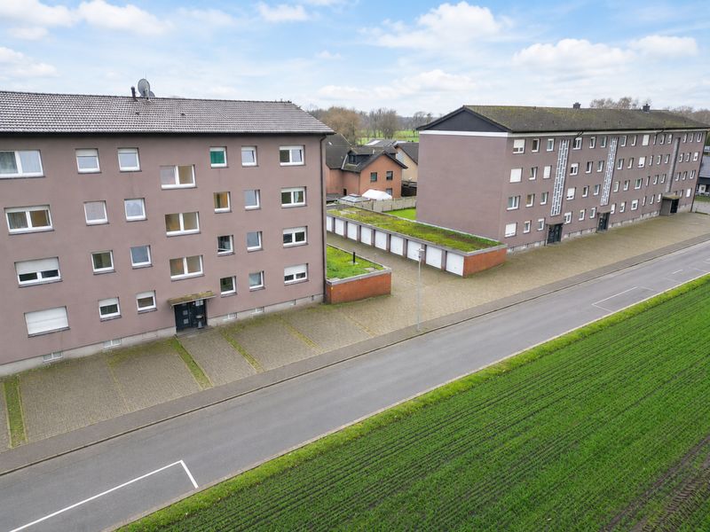 Starkes Renditepaket mit 28  Wohneinheiten und 18 Garagen bei nur einem Mieter!